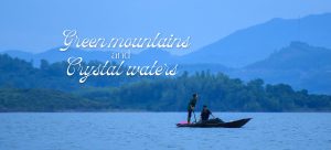 Green mountains and crystal waters